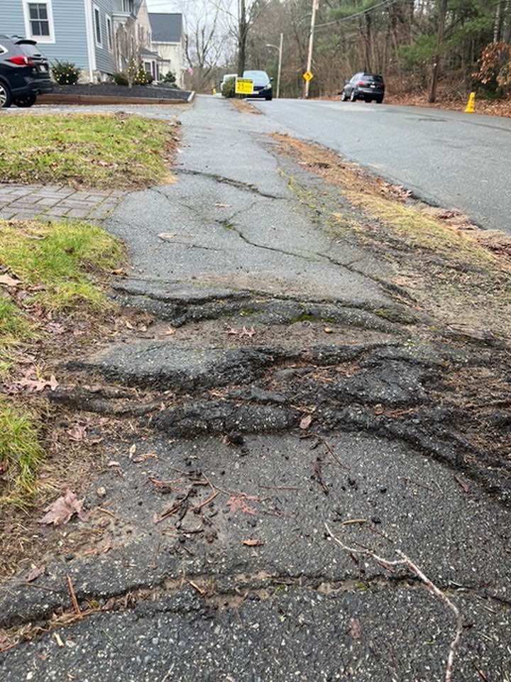 Andover MA poorly maintained asphalt sidewalk